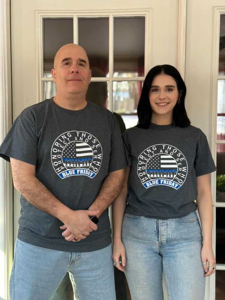 George and Hannah downs modeling blue friday t-shirts